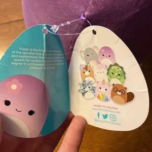 winking violet squishmallow